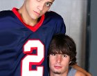 Two hot jock footballers have sex in the locker room
